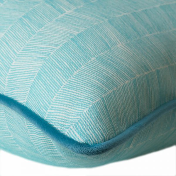 outdoor bolster cushion in vibrant blue herringbone