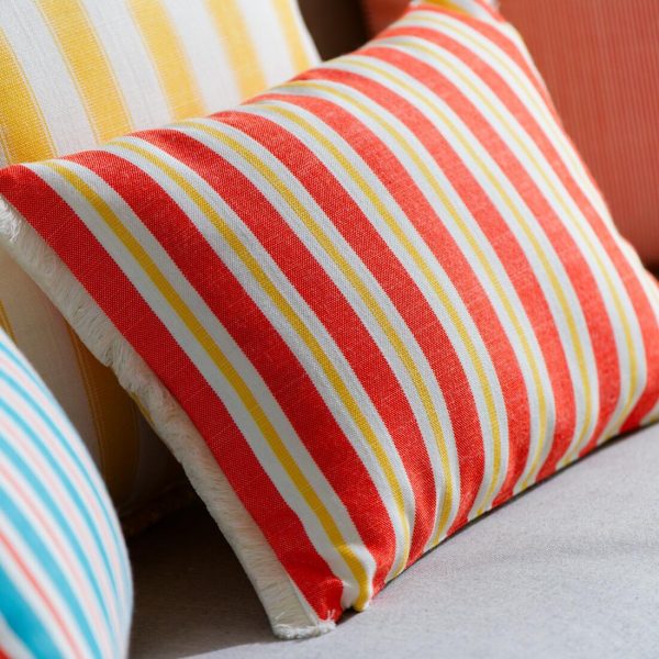 outdoor bolster cushion in orange stripes