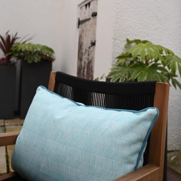outdoor bolster cushion in vibrant blue herringbone