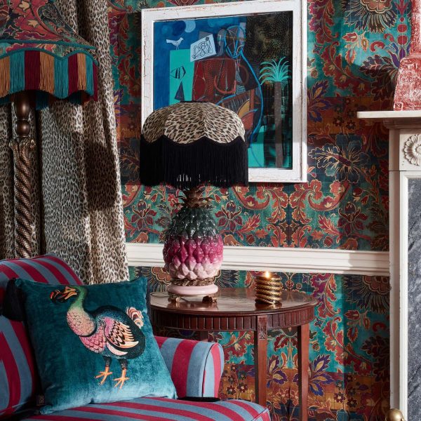 tasselled velvet cushion in petrol blue from House of Hackney