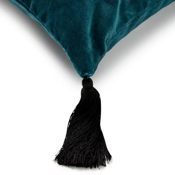 tasselled velvet cushion in petrol blue from House of Hackney