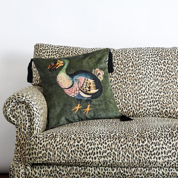 tasselled velvet cushion in green from House of Hackney